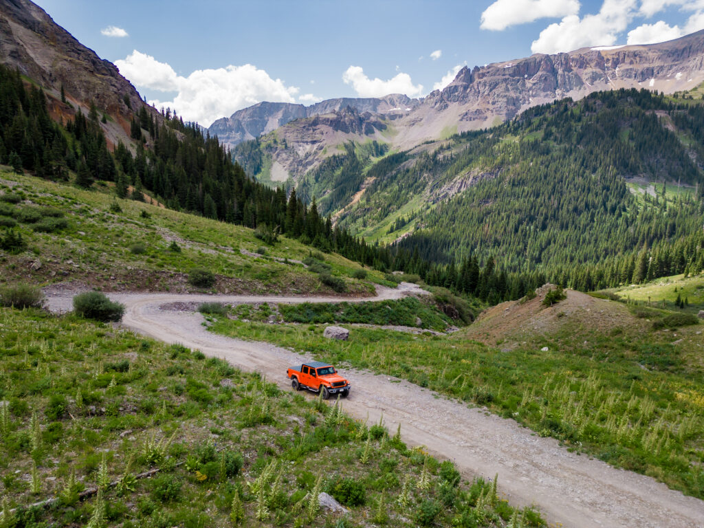 Aerial view of the winding switchback road leading through Yankee Boy Basin in the San Juan Mountains of Colorado.